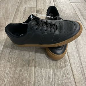 Black with brown trim mens shoes